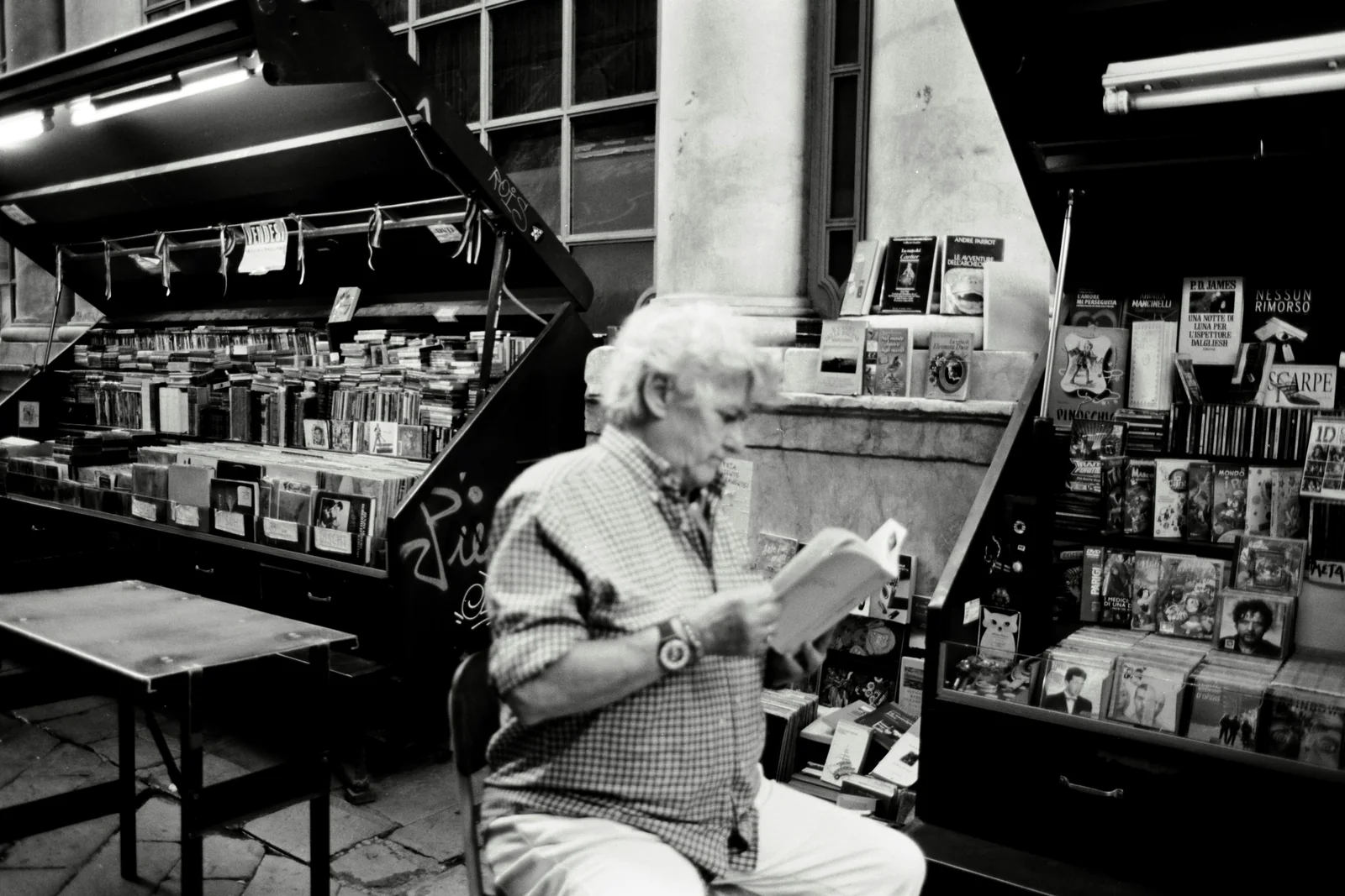 Older man reading during a quiet evening